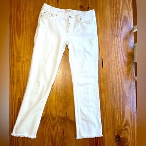We the free White denim jeans with frayed hems/ button fly size 26